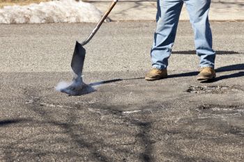 Pothole Filling in Washington, Oklahoma by MJL Asphalt & Chip Seal LLC